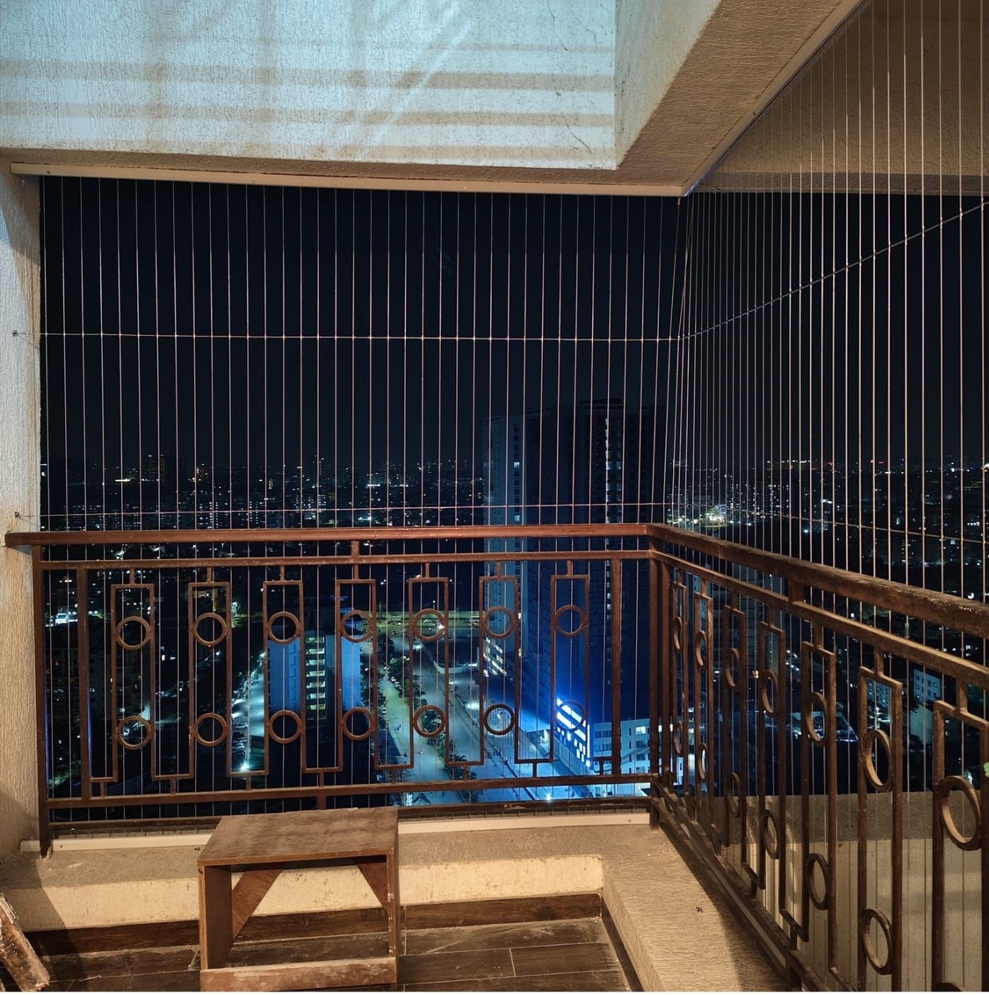 High-rise apartment invisible grill installation